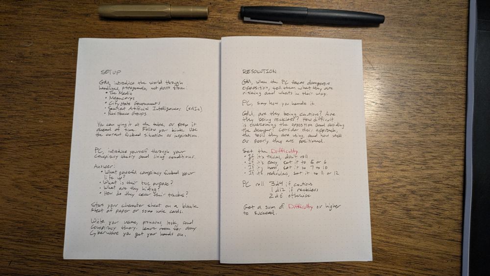 A spread of handwritten pages and two fountain pens