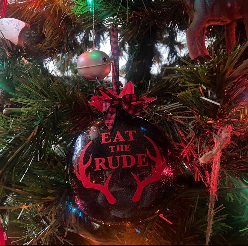 Hannibal Christmas Ornament labeled “Eat The Rude” with antlers surrounding the words
