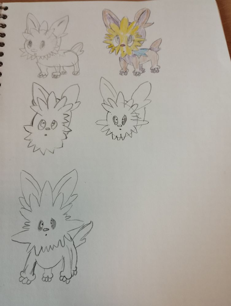 A notebook page with five drawings, allegedly of the Pokémon Lillipup. All five are dreadful but a couple would scare the hardest hearted person.
