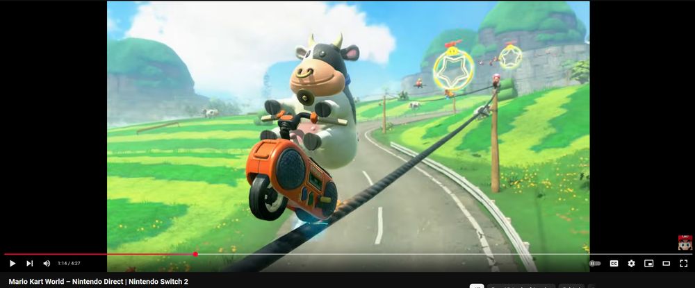 A screenshot of the Mario Kart World announcement video showing a cow from moo-moo meadows grinding a rail on a motorcycle that looks like a boombox