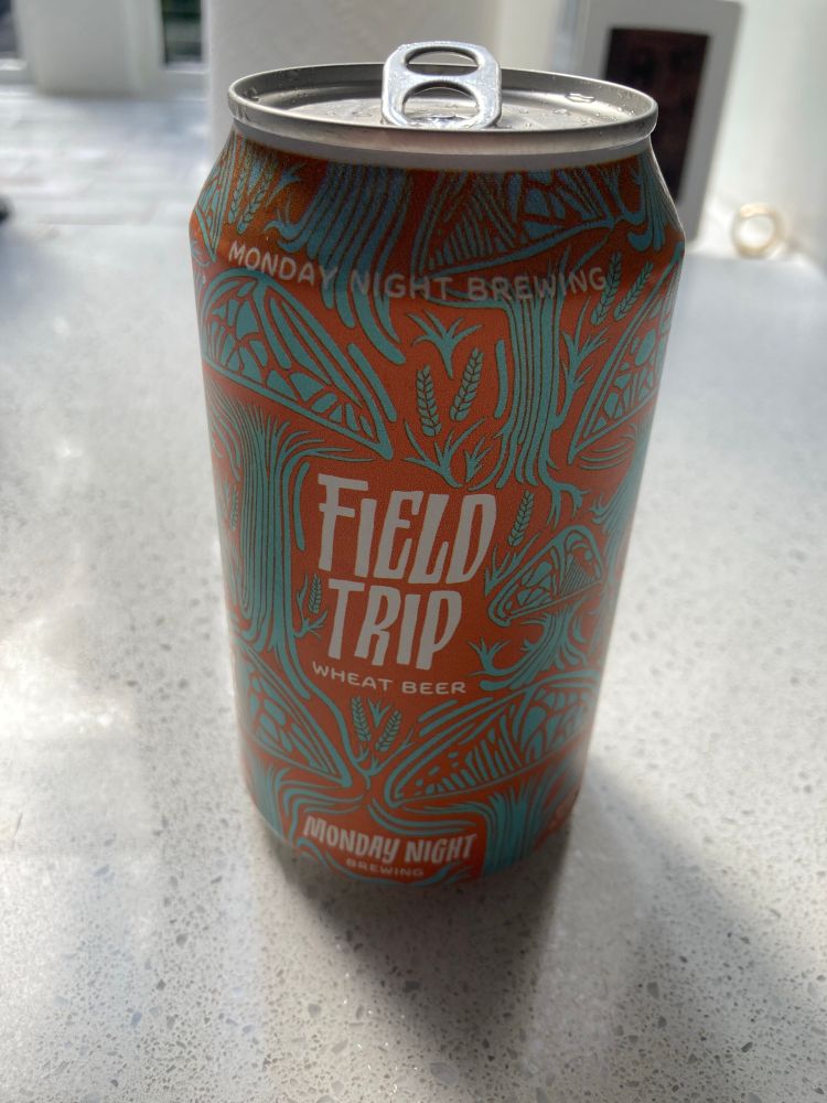 Gold and green can of Field Trip wheat beer from Monday Night Brewing. 
