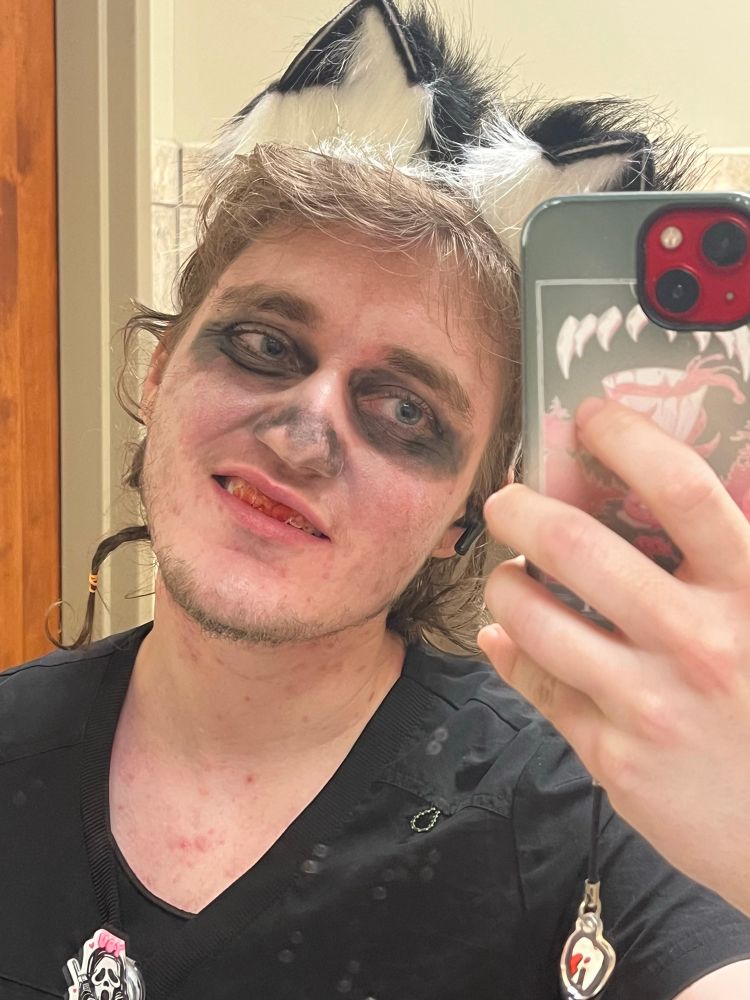 smiledog hutch with teeth all bloody 