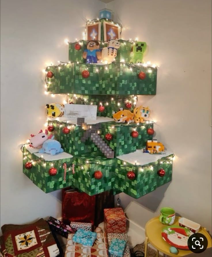 a christmas tree made to look like a minecraft tree, with plushes of several aspects of the game on it