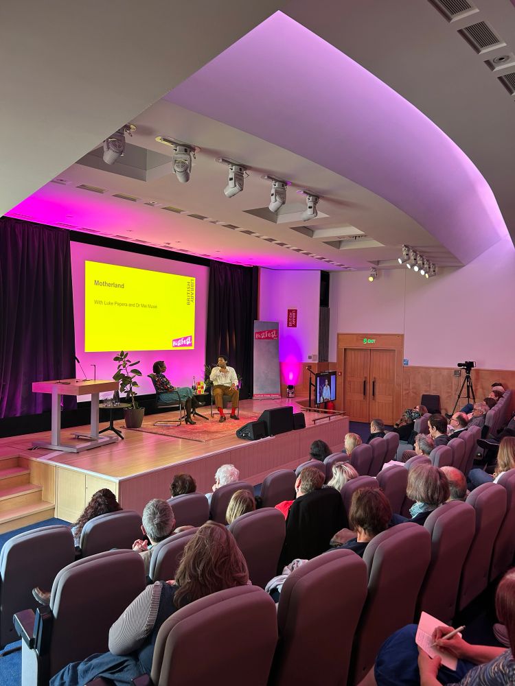 A photo of Mai Musie and Luke Pepera on stage at HistFest 2025