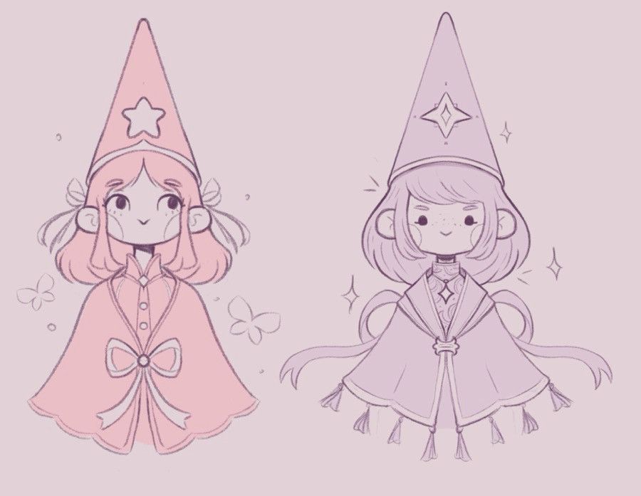 Two girls wearing pointed hats and little capes with ribbons and stars