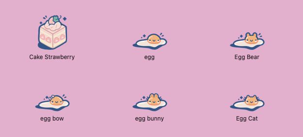 some eggs! One is shaped like a bear, one has a bow, one looks like a bunny and one is a cat! there is also a square strawberry cake slice.
