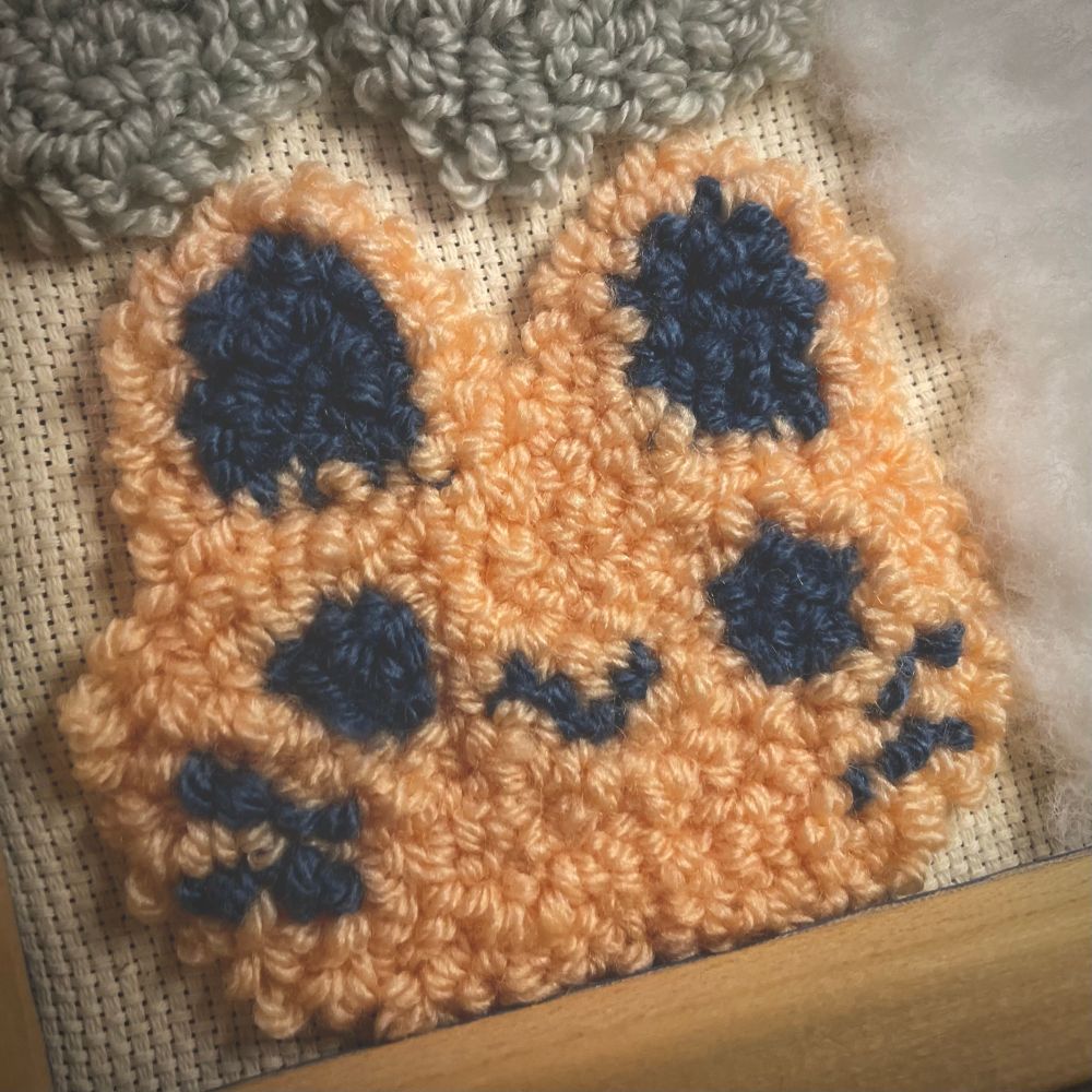 A little punch needle bunny very fuzzy, very cute