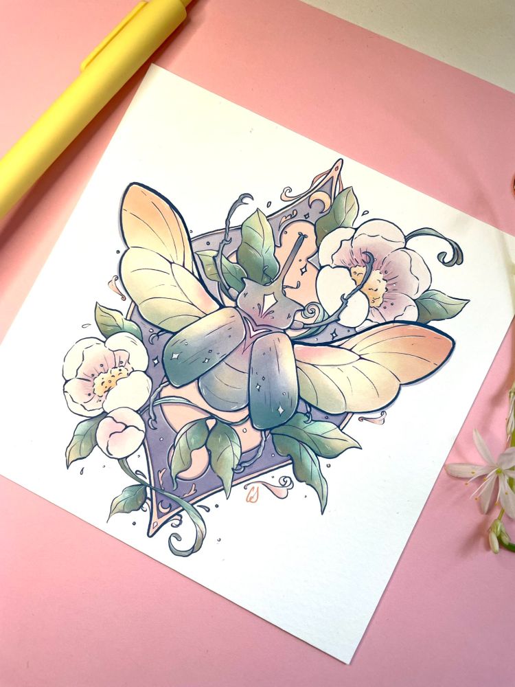 elephant beetle with flowers all around it