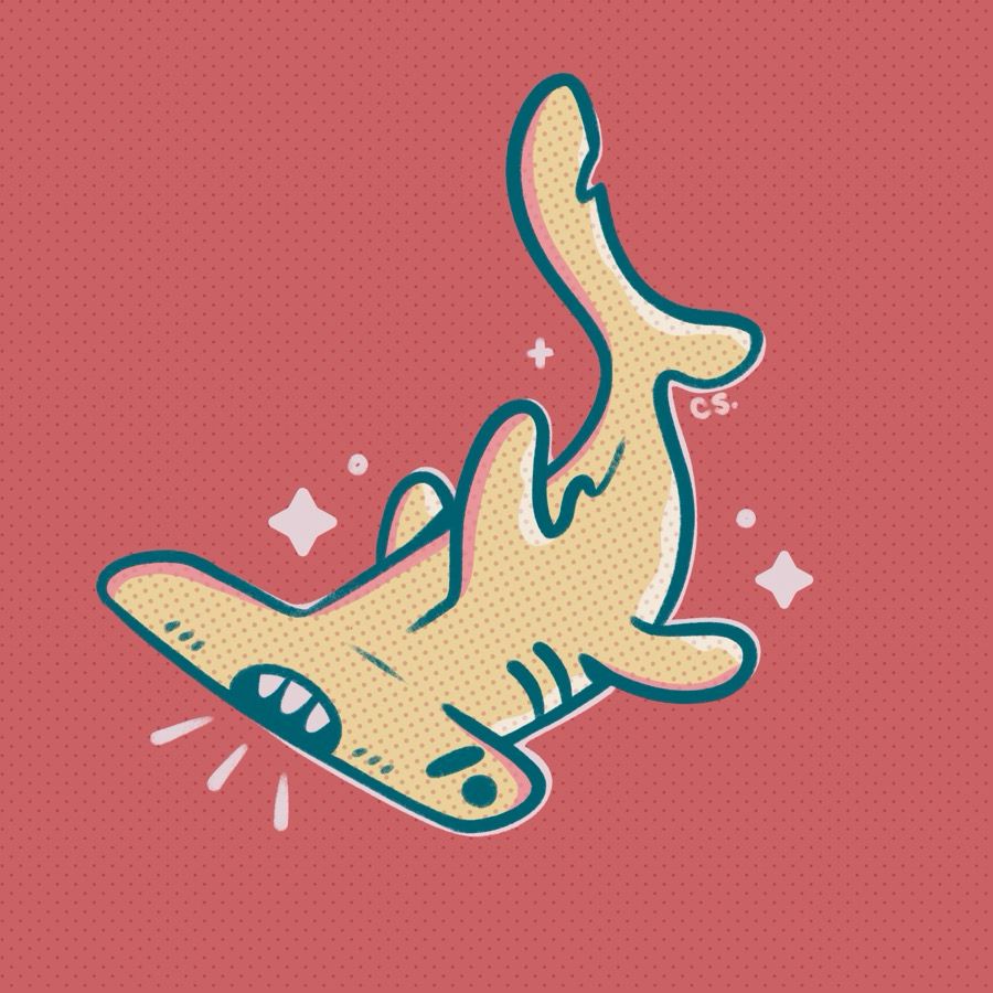 Angry looking hammer head shark with little sparkles around them. They have a very silly, anatomically inaccurate mouth with three teeth on the front of their head.