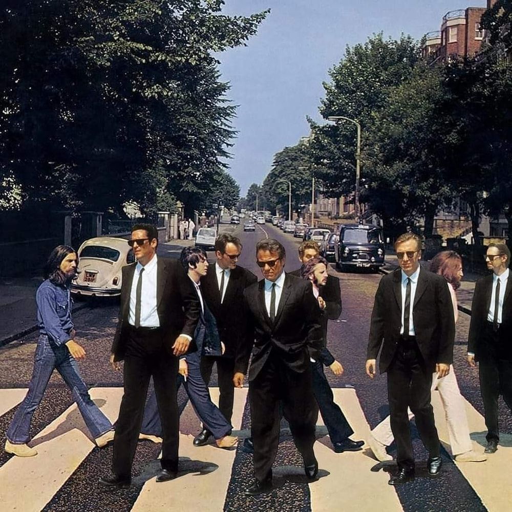Die Reservoir Dogs laufen zwischen den Beatles auf dem Zebrastreifen in der Abbey Road