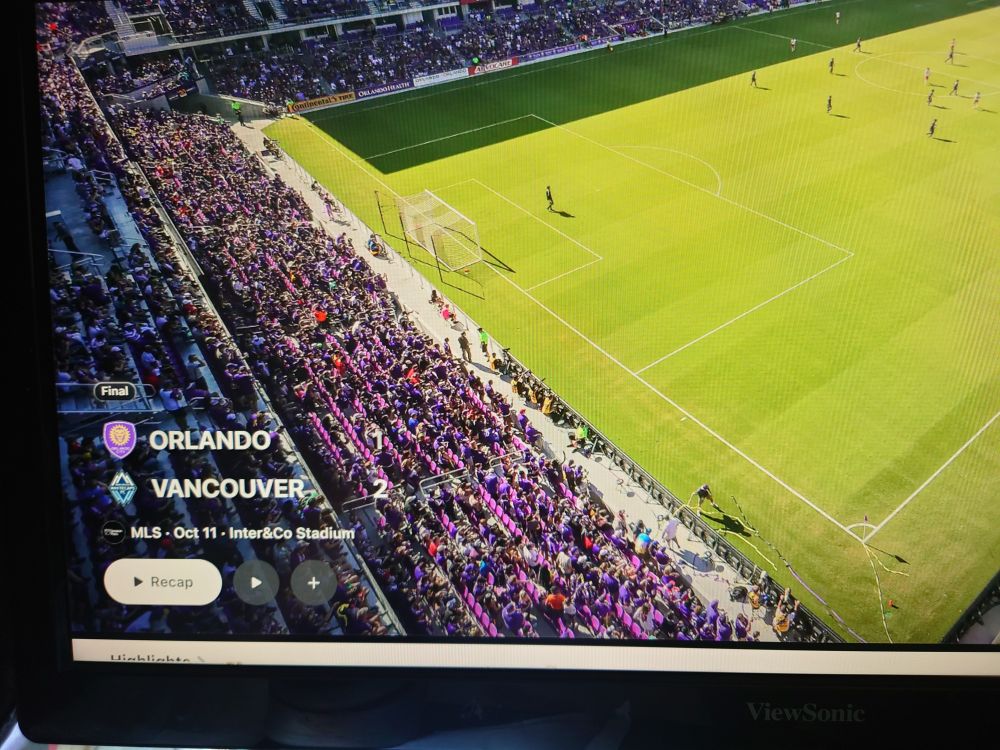 Screenshot of an MLS result from the Apple TV website on OC, showing the Recap button and a play icon for a full replay 