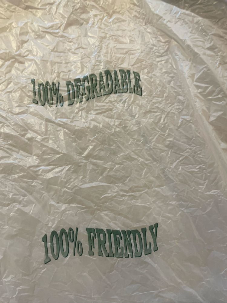 A carrier bag which states ‘100% degradable, 100% friendly’