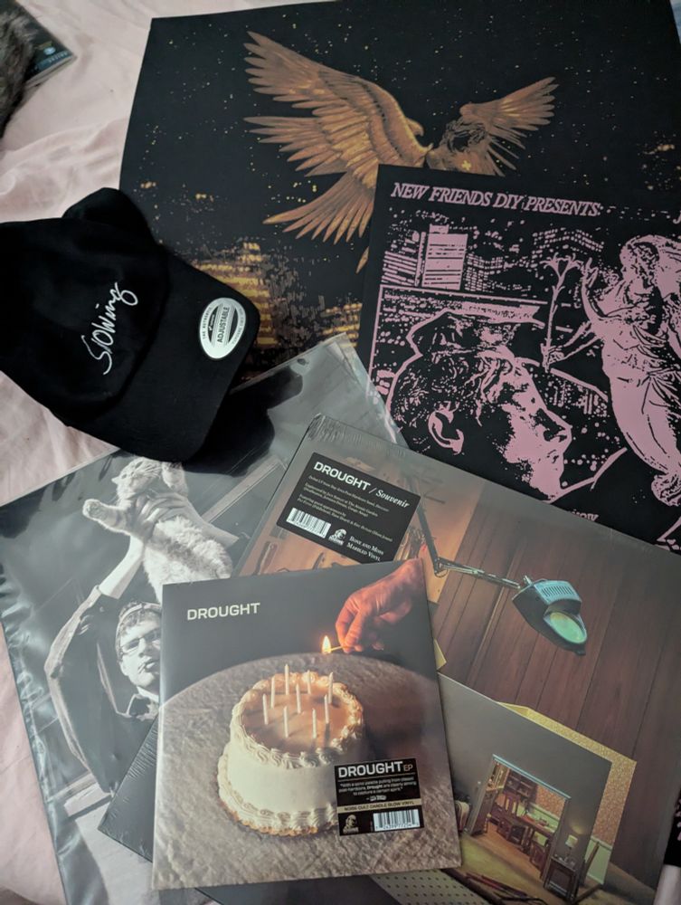 a collection of merch I got from new friends fest

drought EP
drought LP
snowing LP 
new friends poster x 2
snowing hat 