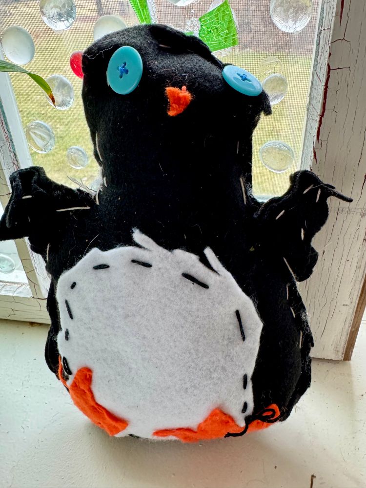 Hand stitched penguin 