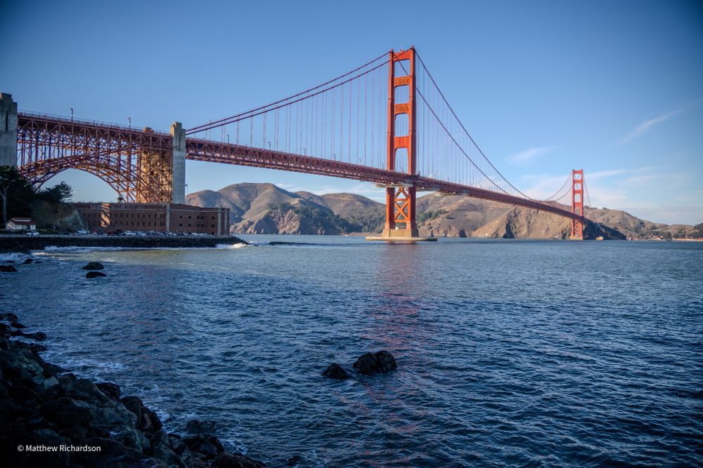 San Francisco Bay in the foreground and the Golden Gate Bridge in the background. 