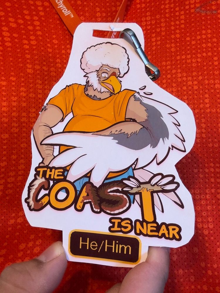 Furry con badge of a man transforming into an anthropomorphic eagle.