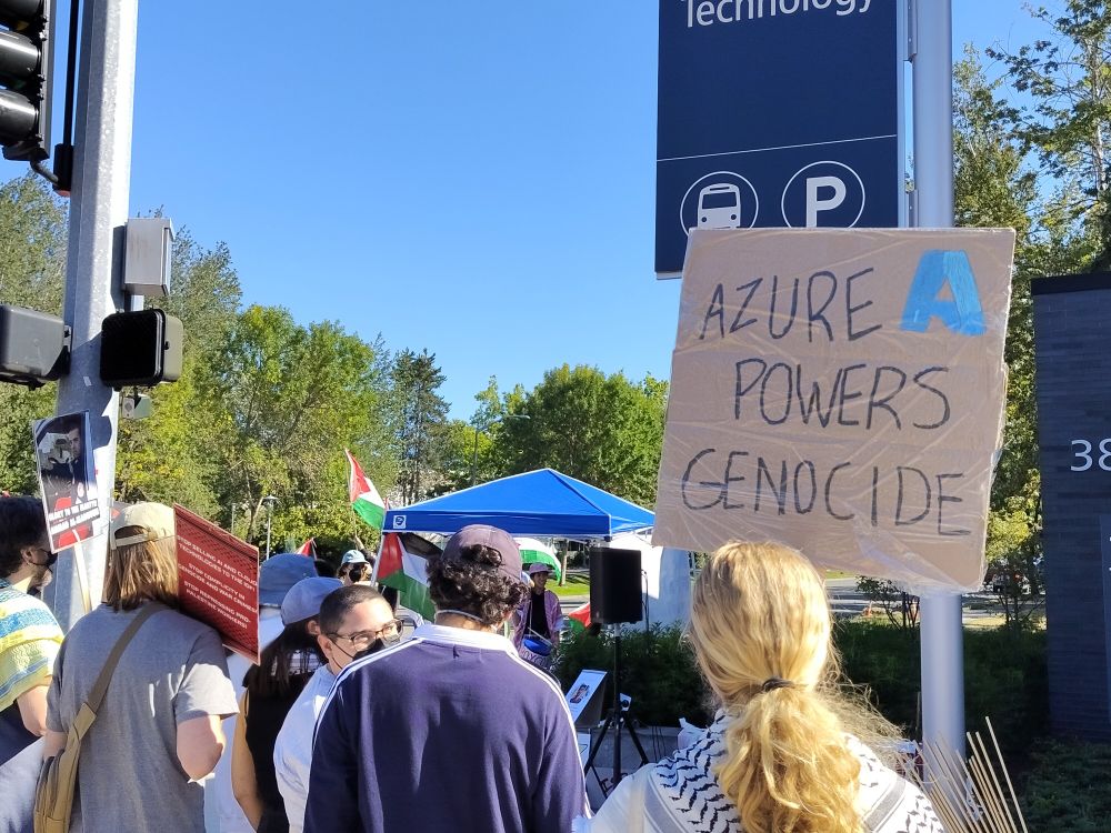 Person with sign azure powers genocide 