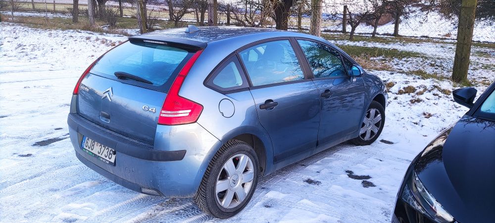 Dark grey Citroen C4 - back view
