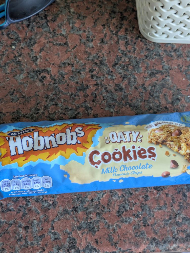 Blue packet with Hobnob Oaty Cookies written on them. 