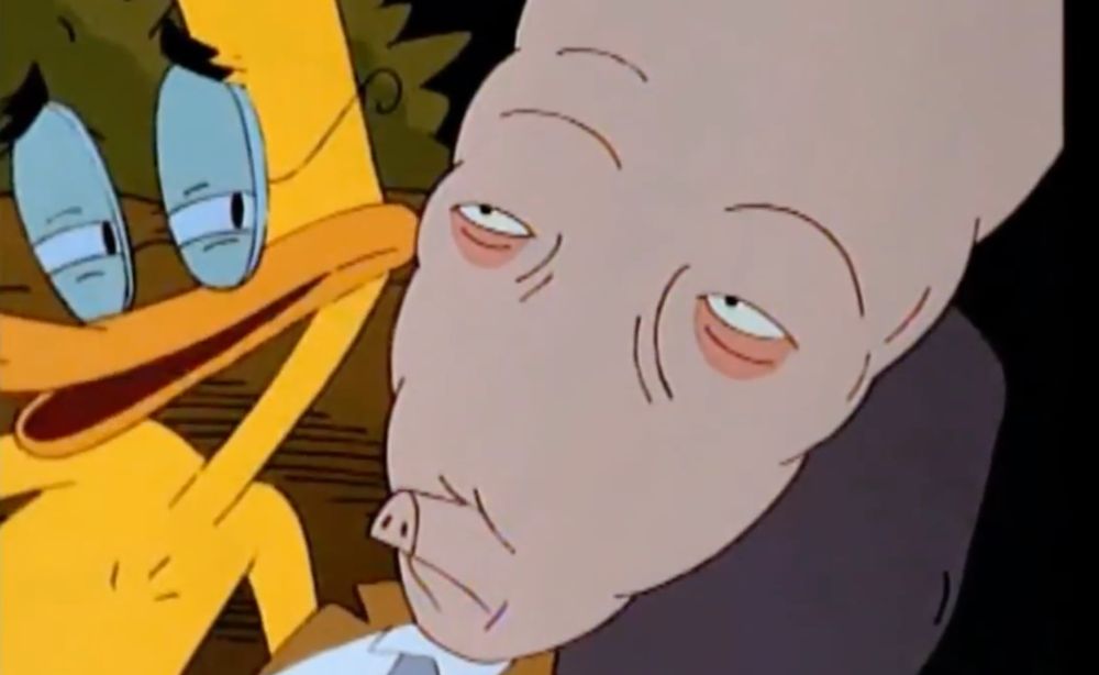 Cornfed trying his best to tell Duckman how to reverse this
