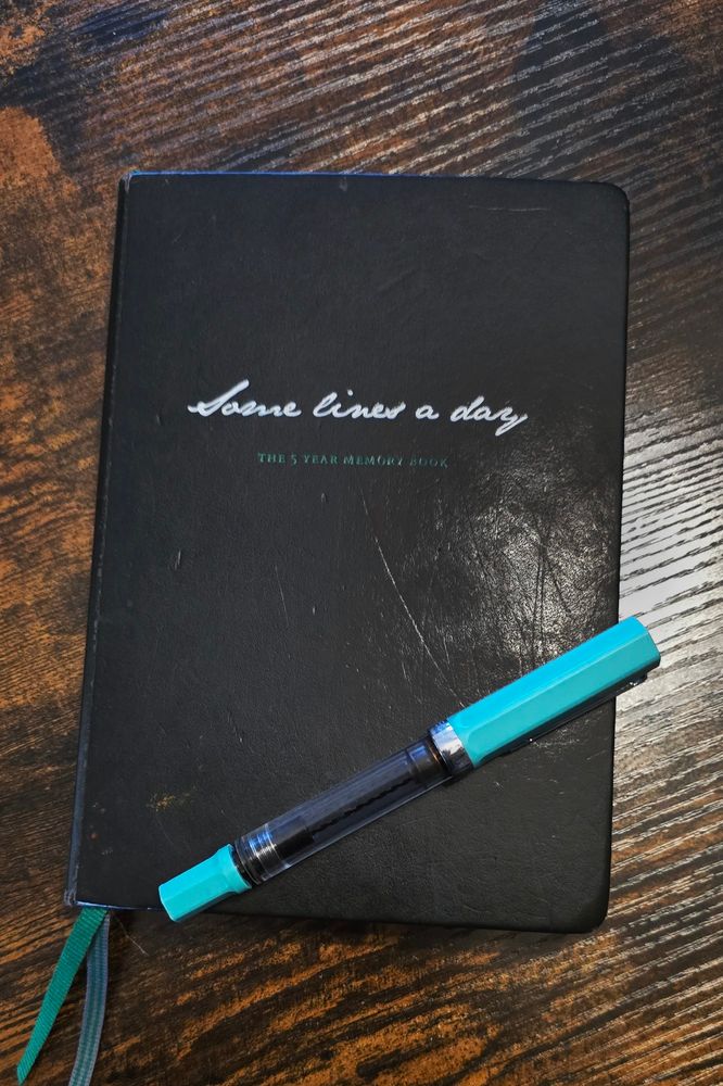 Some Lines a Day (The 5 Year Memory Book) journal and fountain pen.