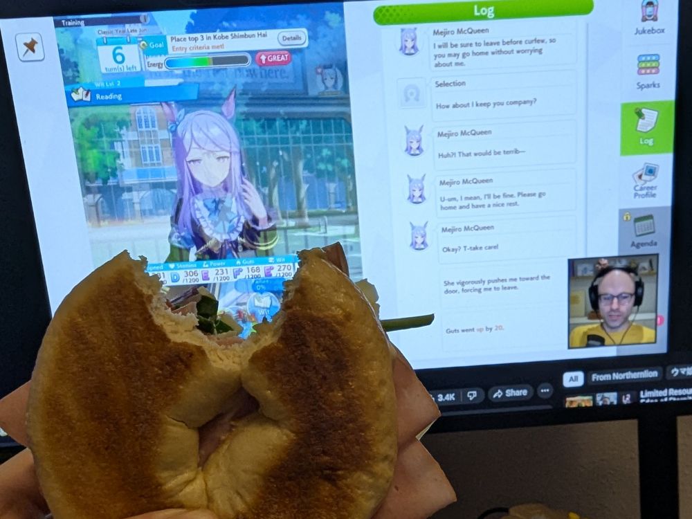 ham, spinach, tomato, onion, pepperjack cheese, salt, pepper, mayo on a toasted plain bagel with a bite taken out of it

being held up in front of a computer monitor with Northernlion playing Umamusume: Pretty Derby

what's better than this