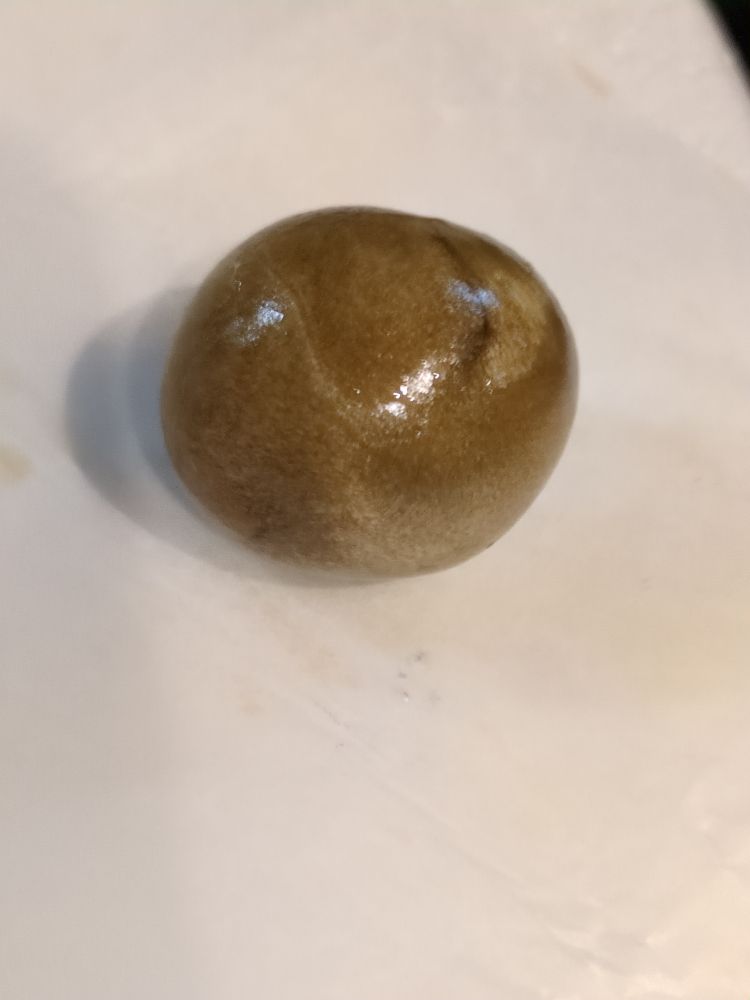 Rosin twisted, braided, and finally rolled into a ball after collecting. 