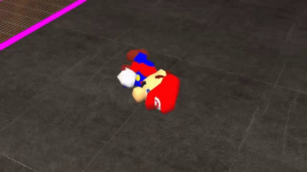 a video game character laying on the floor with a m on his hat