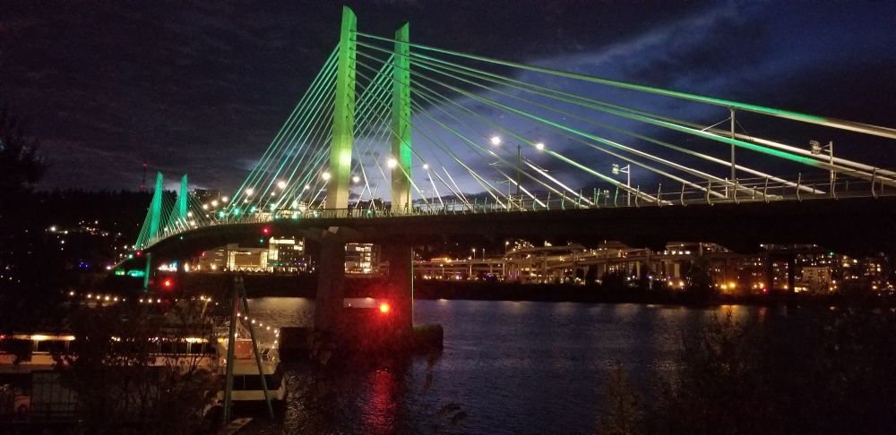 Bridge of the People in Portland, OR lit up at dusk