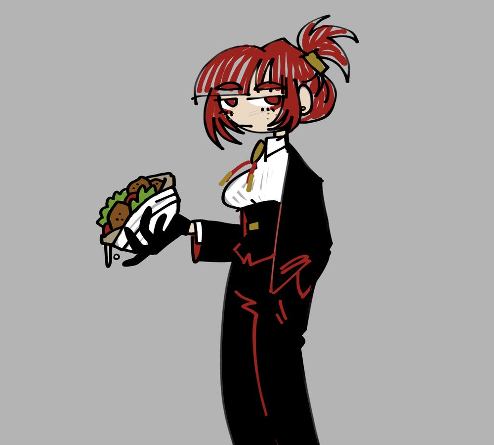 morgan ofthedevil with a falafel sandwich