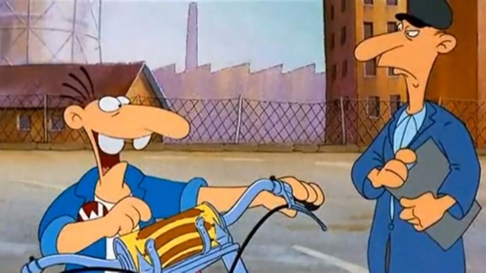 Szene aus Werner Beinhart. Werner präsentiert seinen Wurstblinker beim TÜV.