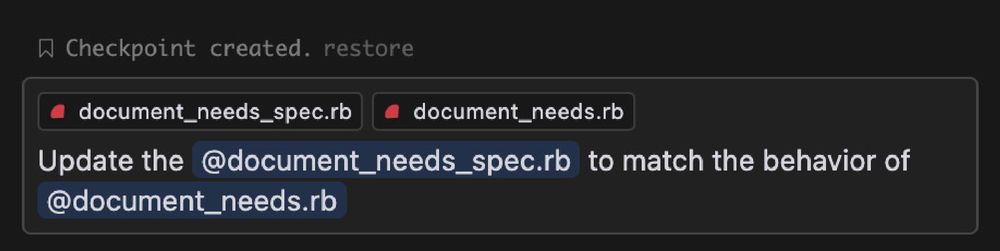 A screenshot of an application in which it has been typed "Update document_needs_spec.rb to match the behavior of document_needs.rb"
