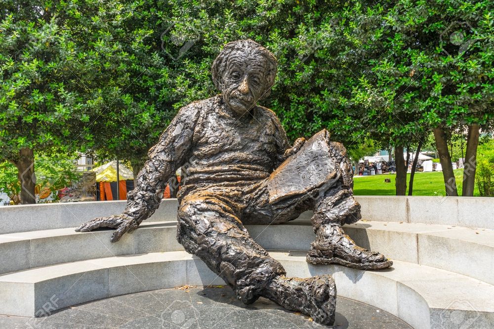 A picture of the Einstein memorial, with a shiny nose from people rubbing git. 