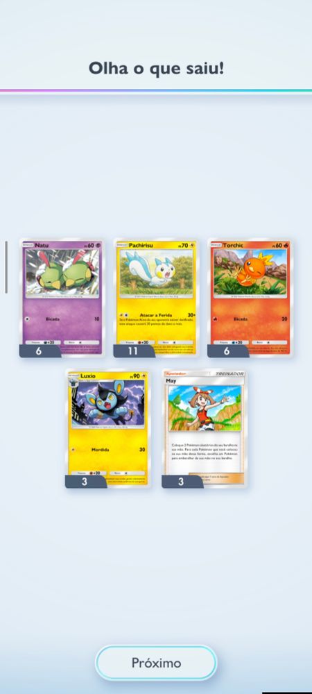 Captura de tela do jogo pokémon TCG Pocket, após a abertura de um pacote de cartas 5 cartas são reveladas.

São elas : Natu, Pachirisu, Torchic, Luxio, May.