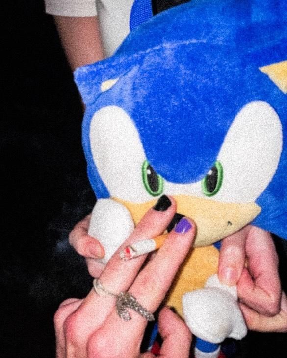 Sonic the hedgehog smoking a cigarette 