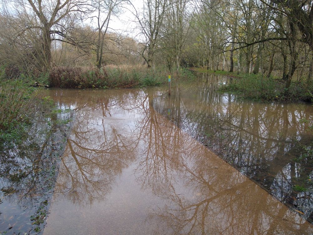 Flooded river side footpaths.