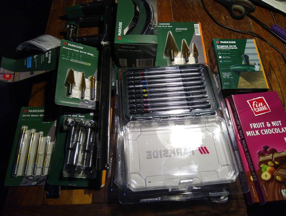 A stack of tools and chocolate.
