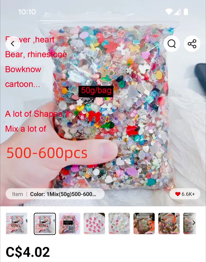 AliExpress listing of random flat-backed nail gems.