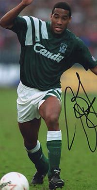 John Barnes playing for Liverpool during the 91/92 season wearing the away green kit. 