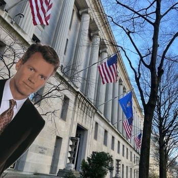 Chris Hansen stands in front of the Robert F. Kennedy Department of Justice Building, home to the office of the US Attorney General