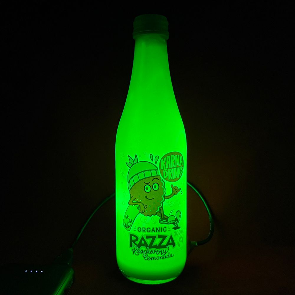 A glowing green bottle lamp I made. It looks cool
