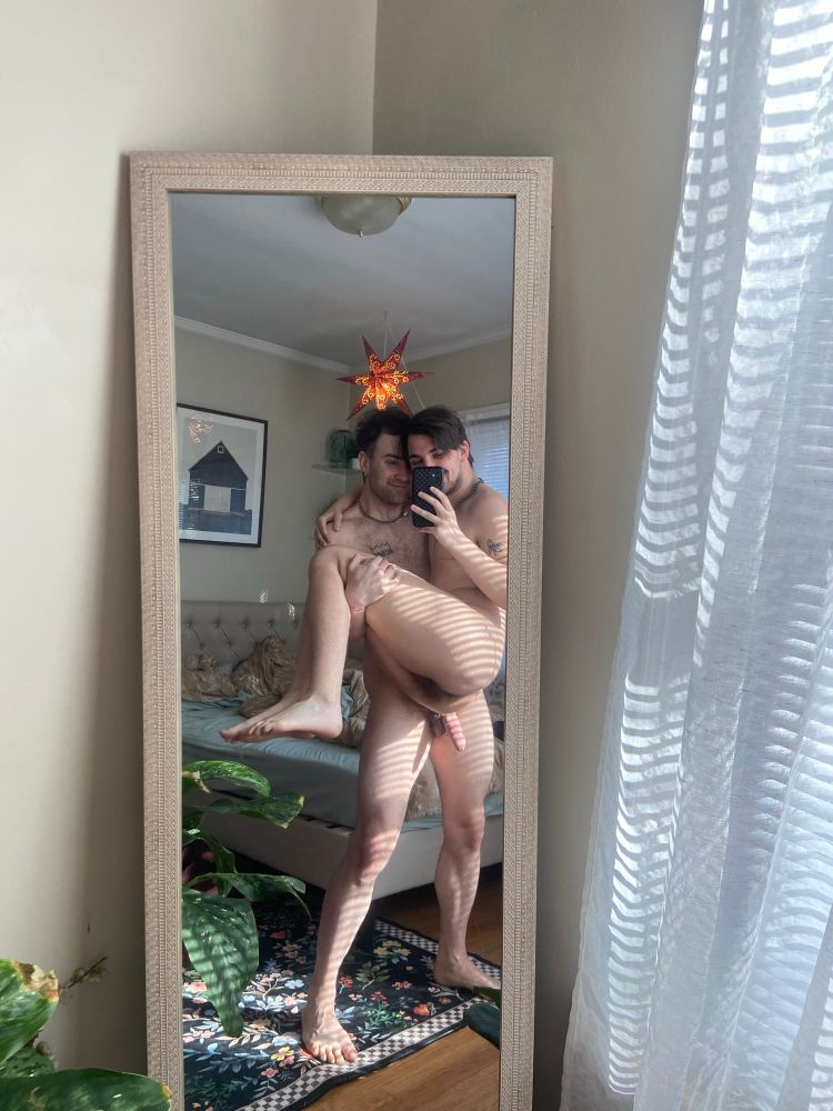 Holding my cute boyfriend in the mirror