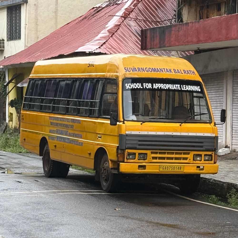 A bus displaying the text “school for appropriate learning”