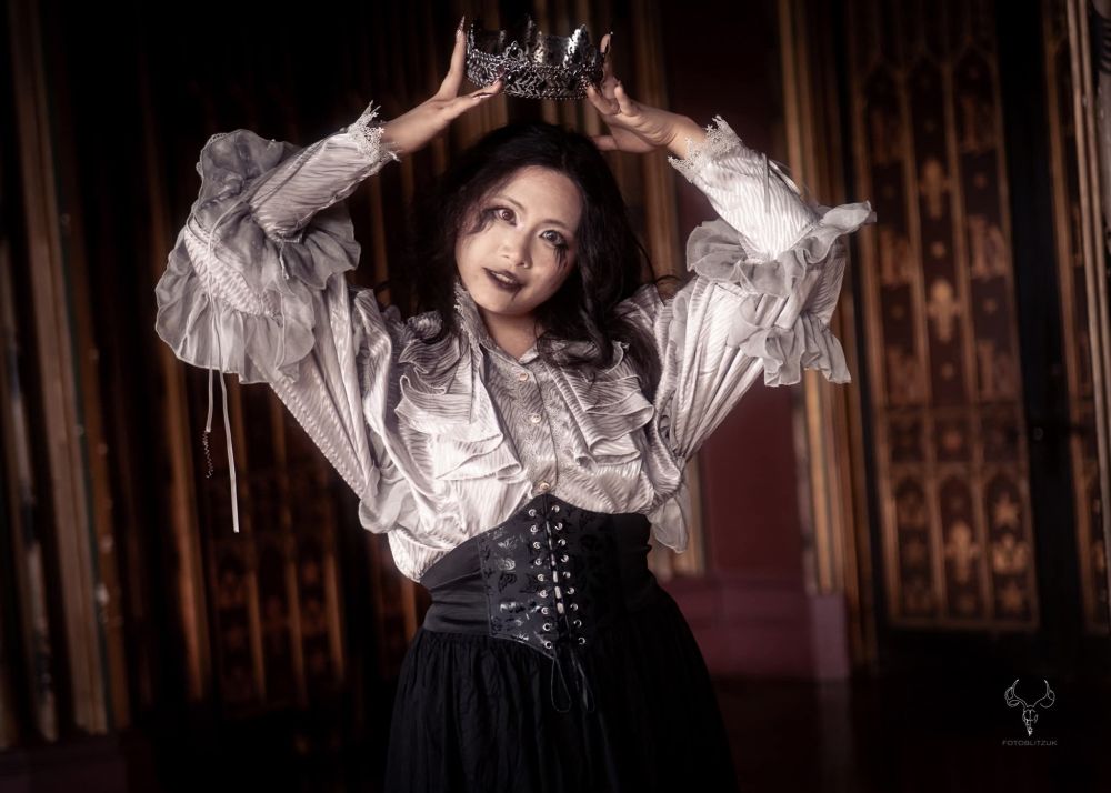 Angel the Red as a vampire with a crown.
