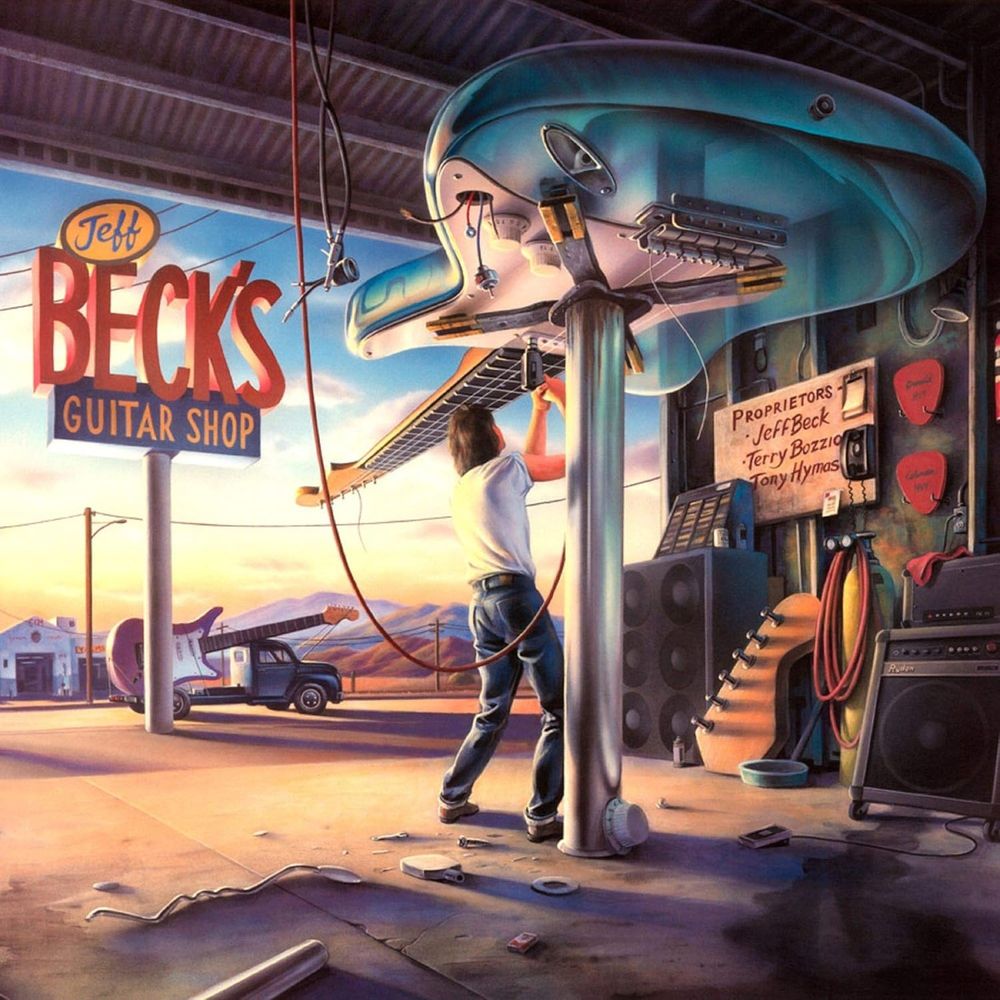 The cover of Jeff Beck's Guitar Shop album.  The vehicle in question is a flat bed truck in the background with a large guitar on it, waiting to be fixed.