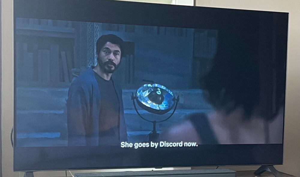 Character in photo on tv says she goes by discord now referring to the main villains name 