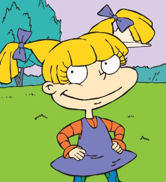 An image of Angelica Pickles from Rugrats, smiling with her hands on he hips.