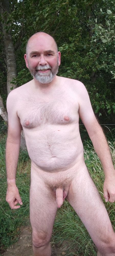 Naked man outdoors