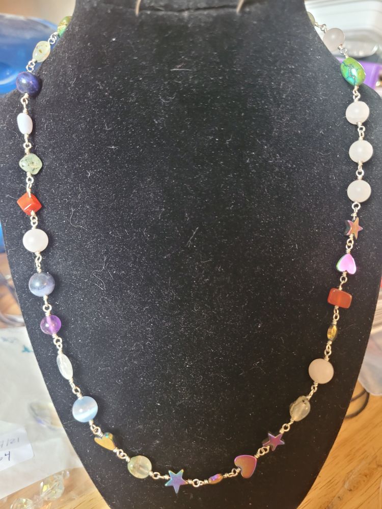 My cancer story necklace. Each type of bead represents a treatment or appointment during that time. 