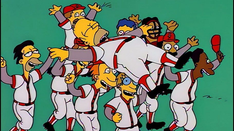 Homer unconscious being carried off the field by his teammates from the Simpsons episode “Homer at Bat.”